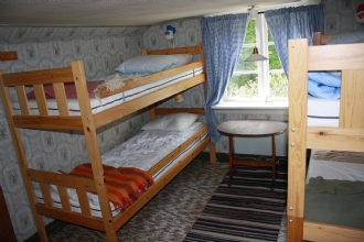 Ett av sovrummen/one of the bedroom
